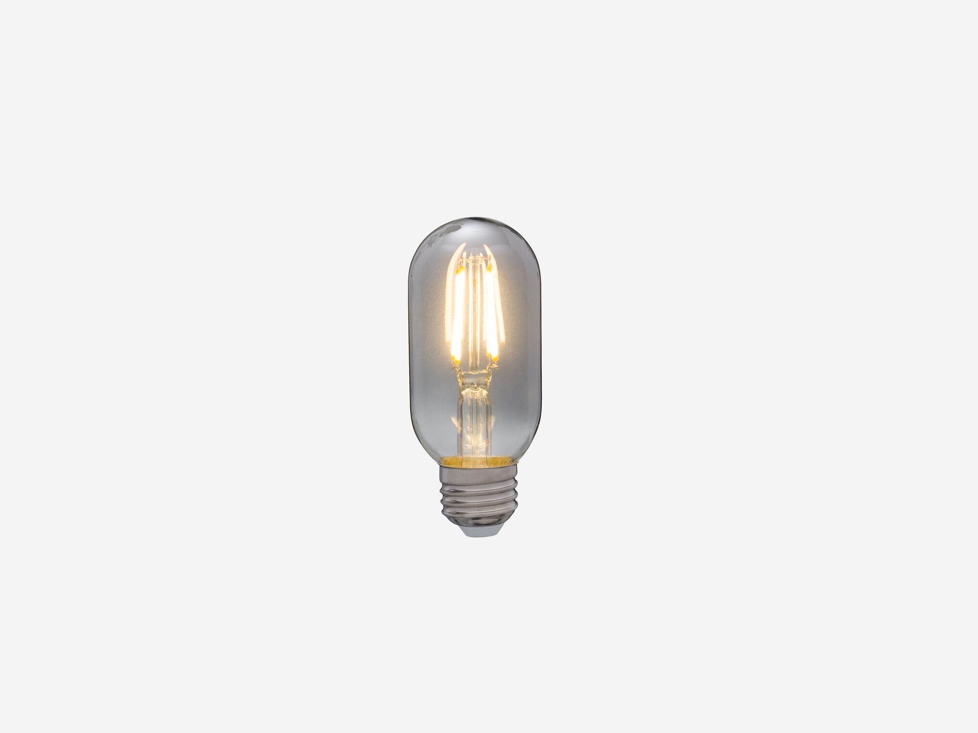 Extra small smoked grey lightbulb with light on front view